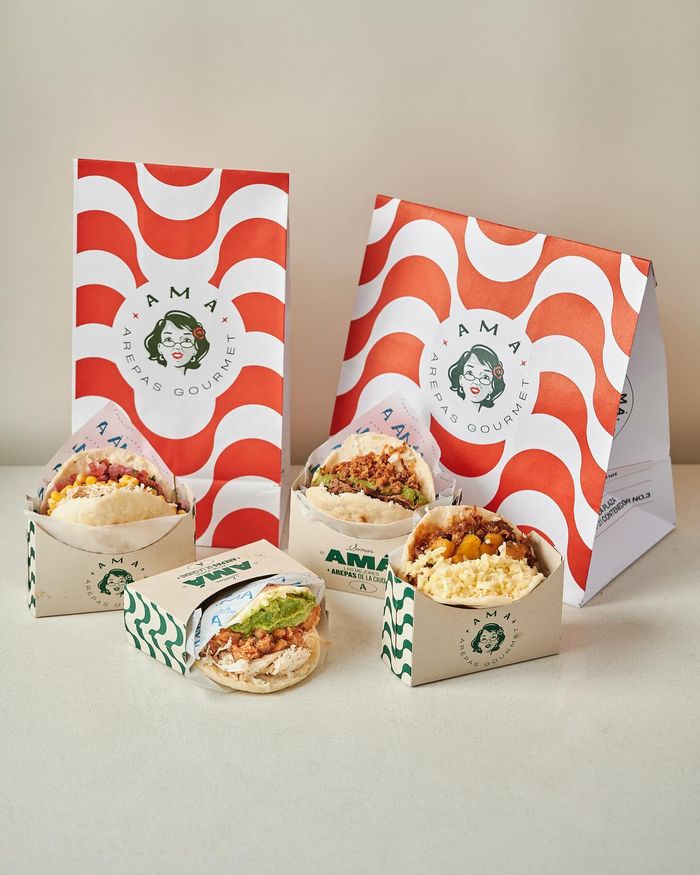 Bolsas y cajas de Amá Arepas Gourmet